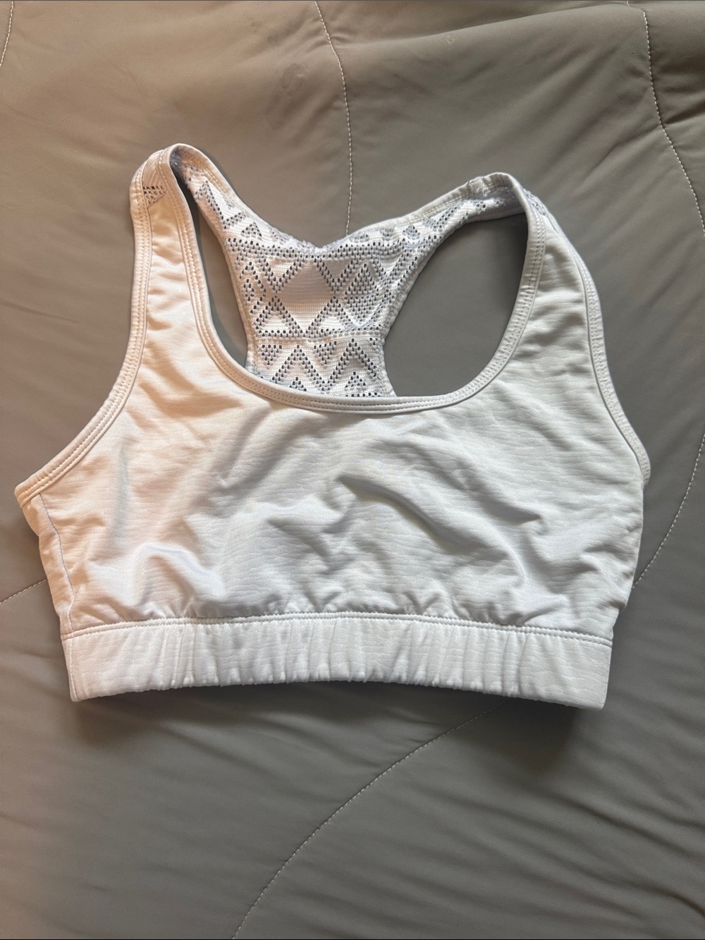 ZYIA White Racerback Lace Sports Bralette doesn’t have pads